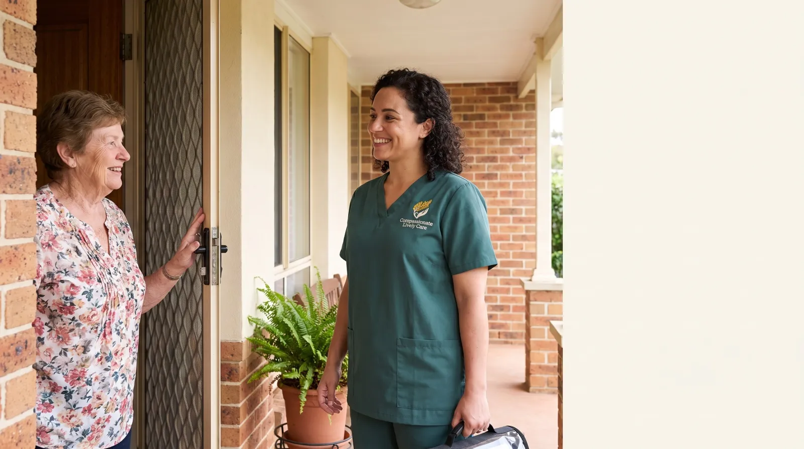 A nurse being welcomed at a front door for a first home visit
